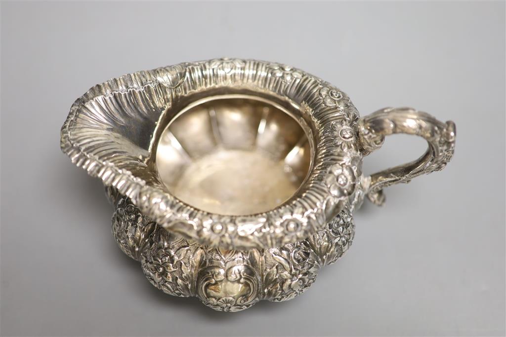 A George IV Irish silver squat melon shaped cream jug, James Le Bas, Dublin, 1828, height 11.2cm, 12oz.